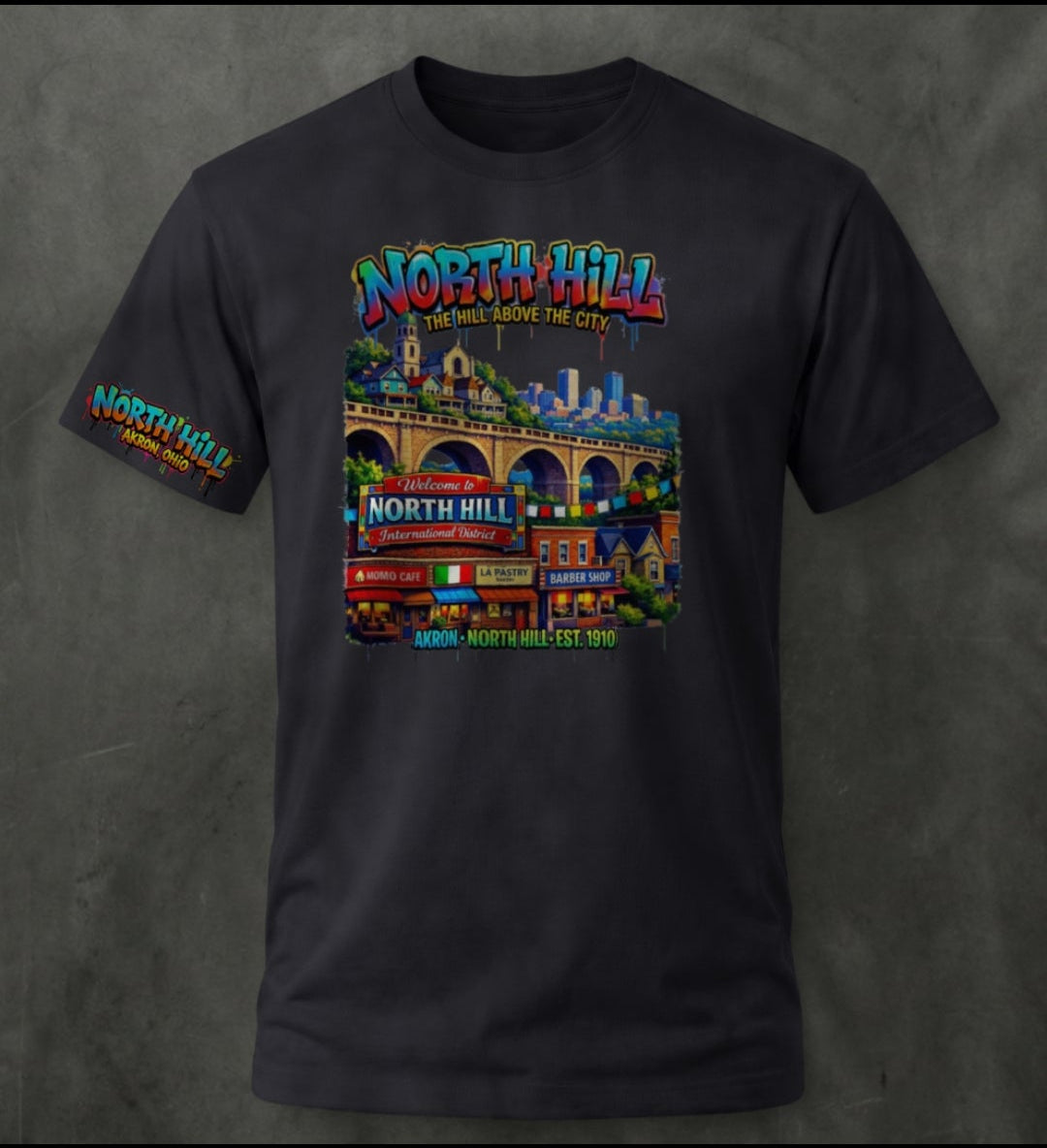 Black t-shirt with colorful 'North Hill' graphic design on a dark background